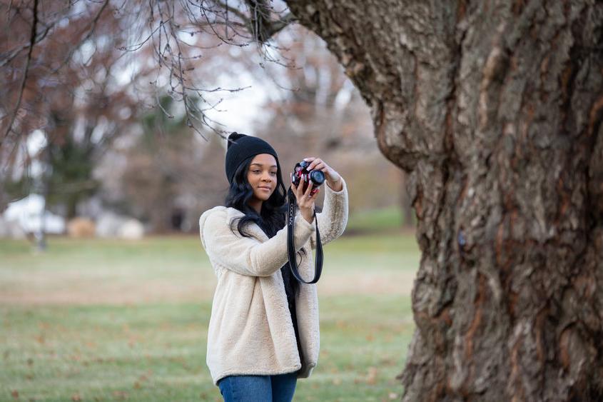 Azariah Shelton photographing nature. 